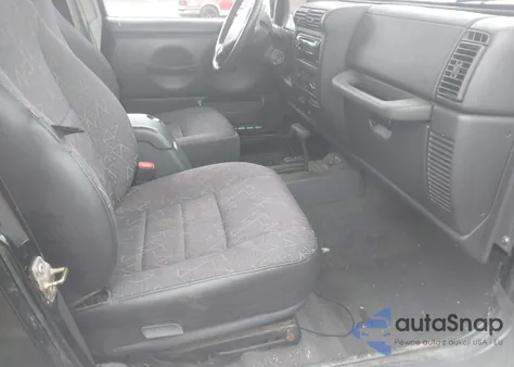 2002 Jeep Wrangler Sport z USA, uszkodzony, nr VIN 1J4FA49S32P735059